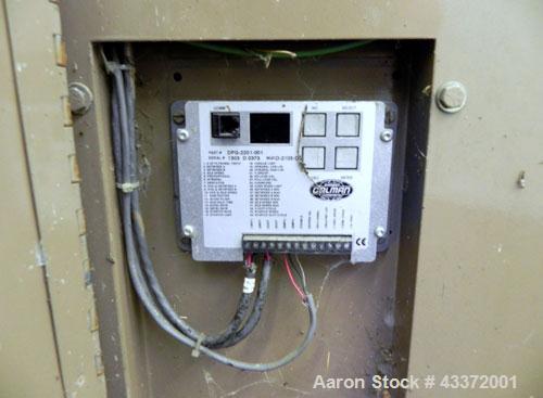Used Magnetek 100 kW standby natural gas generator set, model RNS 1250 SN-PM078611. Ford model LSG-8751-6007-ZA engine SN-04053 L-28-RA. 3/60/208/240/480V or 1/60/120/240V. Main-line circuit breaker....
