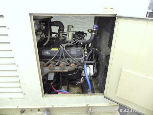 Used Magnetek 100 kW standby natural gas generator set, model RNS 1250 SN-PM078611. Ford model LSG-8751-6007-ZA engine SN-04053 L-28-RA. 3/60/208/240/480V or 1/60/120/240V. Main-line circuit breaker....