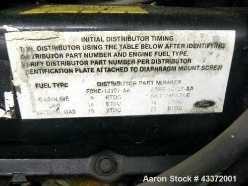 Used Magnetek 100 kW standby natural gas generator set, model RNS 1250 SN-PM078611. Ford model LSG-8751-6007-ZA engine SN-04053 L-28-RA. 3/60/208/240/480V or 1/60/120/240V. Main-line circuit breaker....