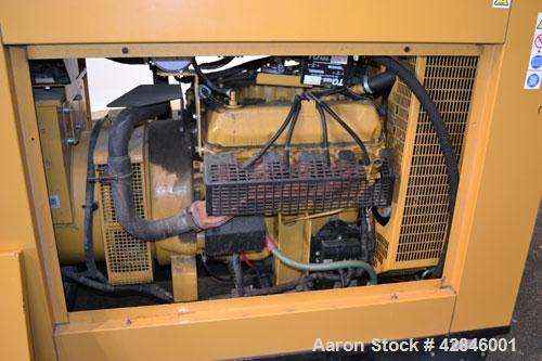 Used CAT / Olympian 100 kW natural gas generator set, model G100F1 SN- E4640A/001. 3/60/120/208V. 400 Amp main-line circuit breaker. Weather Enclosure.195 hours. Year 1999.