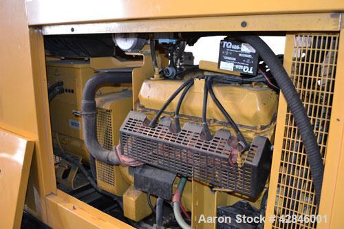 Used CAT / Olympian 100 kW natural gas generator set, model G100F1 SN- E4640A/001. 3/60/120/208V. 400 Amp main-line circuit breaker. Weather Enclosure.195 hours. Year 1999.