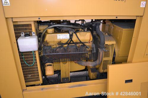 Used CAT / Olympian 100 kW natural gas generator set, model G100F1 SN- E4640A/001. 3/60/120/208V. 400 Amp main-line circuit breaker. Weather Enclosure.195 hours. Year 1999.