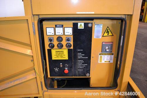 Used CAT / Olympian 100 kW natural gas generator set, model G100F1 SN- E4640A/001. 3/60/120/208V. 400 Amp main-line circuit breaker. Weather Enclosure.195 hours. Year 1999.