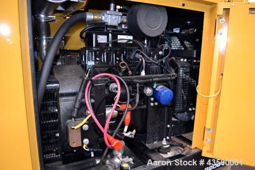New- CAT / Olympian G20G1 20kW natural gas generator set. GM engine 3.0L rated 50 HP @ 1800 RPM SN-GMW00334. 3/60/277/480V 12 lead re-connectable. Main-line circuit breaker. Weather protective enclos...