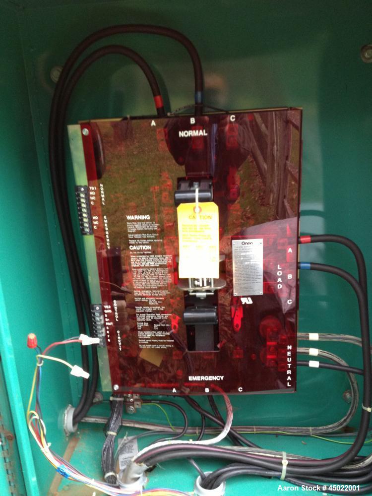 Used Onan Backup Generator, 45 kw, transfer switch 225A, heavy duty Ford 6 cyl engine CSG-6491-6005, in outdoor enclosure, set for propane, manufactured 1990.