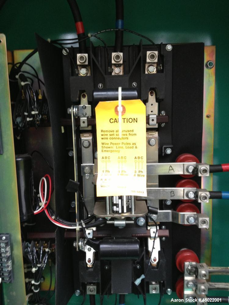 Used Onan Backup Generator, 45 kw, transfer switch 225A, heavy duty Ford 6 cyl engine CSG-6491-6005, in outdoor enclosure, set for propane, manufactured 1990.