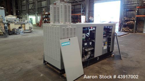 Used Siemens 150 kW Natural Gas Generator, Model T15068KNSY, SN-6065578. 3//60/277/480V. Generac WSG1068 engine 2010 EPA certified. 250 Amp main-line circuit breaker. Sound attenuated enclosure. 10 h...