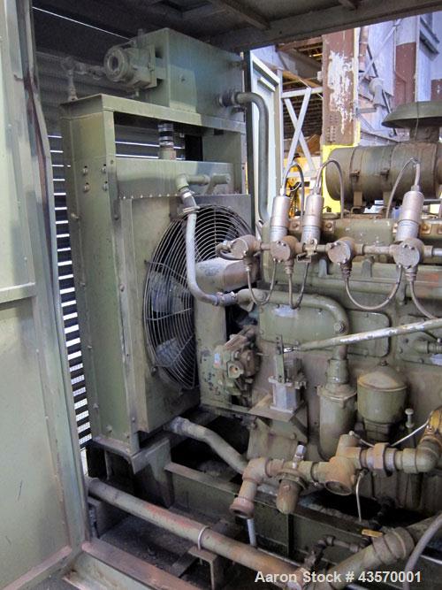 Used Stewart & Stevenson / Waukesha 80kW continuous natural gas generator set. Waukesha model F11G natural gas engine rated 114HP @ 1800 RPM SN-5350202. 3/60/277-480V. Weather enclosure. Engine yr 19...