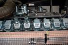 Used Atlas Copco QAC 1006 Package, DDC/MTU, 1000kW standby (900kW prime) portable diesel generator set. DDC/MTU model 16V2000 R163-7K37, EPA Tier 1, four-stroke diesel engine. Mecc-Alte Model ECO 43-...