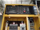 Used CAT 600 kW standby diesel generator set, SN-AER00103, Caterpillar 3412 engine rated 896 HP at 1800 RPM, SN-3FZ02299. 3/60/277/480V. 1200 Amp main-line circuit breaker and 600 Amp load bank circu...