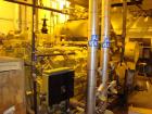 Used CAT 1300 kW cont rated natural gas generator set. CAT G3516B natural gas engine.
CAT generator end model SR4B 3/60/480V, 1800 rpm. 6027 hours. Built 1997.  Includes roof mounted muffler, existin...