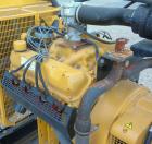 Used CAT/Olympian 60 kW Natural Gas Generator Set, Model G60F1, Serial #E0519A/001. Ford Motor Co natural gas engine, model WSG1068, V10. 3/60/120/240V. Hours 255, year 1999.