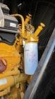 Used Caterpillar 1000kW standby (910kW prime) portable diesel generator set. CAT model C32 engine rated 1372 hp @ 1800 rpm, serial #SYC01134, EPA tier II. 3/60/480V 12 lead reconnectable generator mo...
