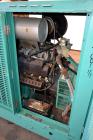 Used Cummins 100 kW standby natural gas generator set, model GGHH-5569198, SN-J020420586. Ford WSG-1068 engine rated 176 HP @ 1800 RPM.3/60/277/480V, rated 100kW 1/60/120V. 125 Amp main-line circuit ...