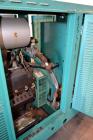Used Cummins 100 kW standby natural gas generator set, model GGHH-5569198, SN-J020420586. Ford WSG-1068 engine rated 176 HP @ 1800 RPM.3/60/277/480V, rated 100kW 1/60/120V. 125 Amp main-line circuit ...