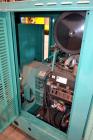 Used Cummins 100 kW standby natural gas generator set, model GGHH-5569198, SN-J020420586. Ford WSG-1068 engine rated 176 HP @ 1800 RPM.3/60/277/480V, rated 100kW 1/60/120V. 125 Amp main-line circuit ...