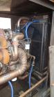 Used Cummins 350 kW standby diesel generator set, Cummins NTTA855G2 engine rated 535 HP @ 1800 RPM, SN-18109439. 3/60/277/480V. 600 Amp main line circuit breaker. Weather enclosure. 215 Hours. Year 1...