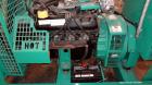 Used Cummins / Onan 80 kW Standby Natural Gas Generator Set, Model 80GGHC-67, Serial E990909239. Ford LSG-875I-6005-A engine, serial 13606-1-04-98. 3/60/277/480. 150 Amp mainline circuit breaker. Coo...