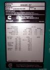 Used Cummins / Onan 80 kW Standby Natural Gas Generator Set, Model 80GGHC-67, Serial E990909239. Ford LSG-875I-6005-A engine, serial 13606-1-04-98. 3/60/277/480. 150 Amp mainline circuit breaker. Coo...