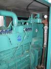 Used Cummins 215 kW natural gas generator set. Cummins GTA855-GS/GC2 engine. 3/60/277/480V, main-line circuit breaker 1200 amp. Sound attenuated enclosure. 179 hours. Yr 2001.