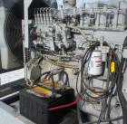 Used Detroit Diesel / Spectrum 150 kW standby generator set. Model 150DS60 SN-387426. 3/60/277/480V.Main-line curcuit breaker. Battery charger, block heater, sub-base fuel tank, muffler. 275Hrs,