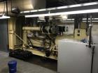Used Detroit 1000 kW diesel generator set. Open skid unit.