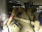 Used Detroit 1000 kW diesel generator set. Open skid unit.