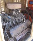 Used Generac 100kW natural gas generator set. Generac 2000 series model 3031950200. Ford 6.8L engine model OD 3454. 3/60/120/208V. 400 amp main line circuit breaker. Includes a battery charger. 97.1 ...