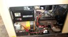 Used Generac 50 kW prime rated natural gas generator set, model DG 50 SN-3675472. Generac 5.7L engine rated 74 HP @ 1800 RPM. 3/60/120/208V. 200 Amp main-line circuit breaker. Weather enclosure. 22 h...