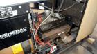 Used Generac 50 kW prime rated natural gas generator set, model DG 50 SN-3675472. Generac 5.7L engine rated 74 HP @ 1800 RPM. 3/60/120/208V. 200 Amp main-line circuit breaker. Weather enclosure. 22 h...