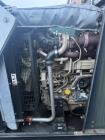 Used Generac Magnum MMG100, serial number 1412212, with only 48.6 hours of operation. It is powered by a John Deere 4045HFG92 engine (serial number PE4045R058275) featuring a 4.5L displacement and AT...