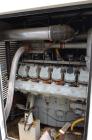 Used Hess / Doosan 400 kW natural gas generator. Doosan model GV222TIC engine.