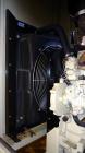 Used Kohler 62 kW standby diesel generator set, model 60REOZJB, SN-2104402. John Deere 4045T150 engine rated 110 HP @ 1800 RPM, emissions EPA tier 2 certified. 3/60/120/240V with PMG permanent magnet...