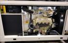 Used Kohler 80 kW Standby Natural Gas Generator Set, Model 80RZ72, Serial #388591. Ford LSG 875 engine rated 132 hp @ 1800 rpm, serial #07533 A-04-RH. 3/60/480V. Mainline circuit breaker. Coolant hea...