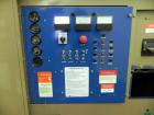 Used Magnetek 100 kW standby natural gas generator set, model RNS 1250 SN-PM078611. Ford model LSG-8751-6007-ZA engine SN-04053 L-28-RA. 3/60/208/240/480V or 1/60/120/240V. Main-line circuit breaker....