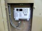 Used Magnetek 100 kW standby natural gas generator set, model RNS 1250 SN-PM078611. Ford model LSG-8751-6007-ZA engine SN-04053 L-28-RA. 3/60/208/240/480V or 1/60/120/240V. Main-line circuit breaker....