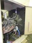Used Magnetek 100 kW standby natural gas generator set, model RNS 1250 SN-PM078611. Ford model LSG-8751-6007-ZA engine SN-04053 L-28-RA. 3/60/208/240/480V or 1/60/120/240V. Main-line circuit breaker....