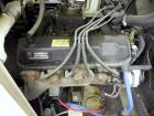 Used Magnetek 100 kW standby natural gas generator set, model RNS 1250 SN-PM078611. Ford model LSG-8751-6007-ZA engine SN-04053 L-28-RA. 3/60/208/240/480V or 1/60/120/240V. Main-line circuit breaker....