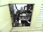 Used Magnetek 100 kW standby natural gas generator set, model RNS 1250 SN-PM078611. Ford model LSG-8751-6007-ZA engine SN-04053 L-28-RA. 3/60/208/240/480V or 1/60/120/240V. Main-line circuit breaker....