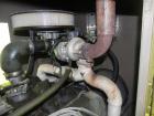 Used Magnetek 100 kW standby natural gas generator set, model RNS 1250 SN-PM078611. Ford model LSG-8751-6007-ZA engine SN-04053 L-28-RA. 3/60/208/240/480V or 1/60/120/240V. Main-line circuit breaker....