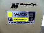 Used Magnetek 100 kW standby natural gas generator set, model RNS 1250 SN-PM078611. Ford model LSG-8751-6007-ZA engine SN-04053 L-28-RA. 3/60/208/240/480V or 1/60/120/240V. Main-line circuit breaker....