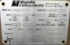 Used Magnetek 100 kW standby natural gas generator set, model RNS 1250 SN-PM078611. Ford model LSG-8751-6007-ZA engine SN-04053 L-28-RA. 3/60/208/240/480V or 1/60/120/240V. Main-line circuit breaker....