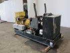 Used Cat / Olympian 100 kW propane fueled generator set, model 96A0749S, SN-2026003. GM 7.4L engine. 3/60/120/208V. (2) 150 Amp main-line circuit breakers. Battery charger. Coolant heater. 42.7 hours...