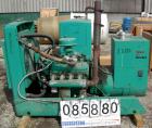 Used Onan 60 KW Natural Gas Generator Set, Model 60 OEN-15/30100D, 3/60/277/480 Volt, 1800 RPM (can be wired 1/120/240 Volt). Mounted on a carbon steel frame. 1716 hours.