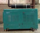 Used Onan Backup Generator, 45 kw, transfer switch 225A, heavy duty Ford 6 cyl engine CSG-6491-6005, in outdoor enclosure, set for propane, manufactured 1990.
