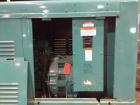Used Onan Backup Generator, 45 kw, transfer switch 225A, heavy duty Ford 6 cyl engine CSG-6491-6005, in outdoor enclosure, set for propane, manufactured 1990.