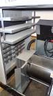 Used Siemens 150 kW Natural Gas Generator, Model T15068KNSY, SN-6065578. 3//60/277/480V. Generac WSG1068 engine 2010 EPA certified. 250 Amp main-line circuit breaker. Sound attenuated enclosure. 10 h...