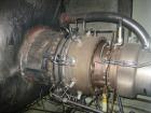 Used Solar Saturn 800 kW continuous / 900 kW standby gas turbine generator set, model GC1-SB-MA. Marathon Electric Magna One generator, model 682-FDR-8164-AA, 3/60/2400/4160V. Sound enclosure.