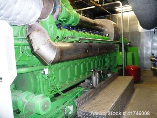 Used 3 MW Jenbacher Gas Generator, type J6-20, 10,500V, 50 hz, with service book, gas/smoke cleaner and electric control panel. Year 2006. 15,000 hours.