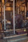 Used Dresser Rand 850kW steam turbine generator set. 3/60/4160V Louis Allis gen end. Turbine frame 703HE, induction generator, turbine rating 850 kW at 3635 rpm, # turbine stages 1 Curtis, inlet stea...